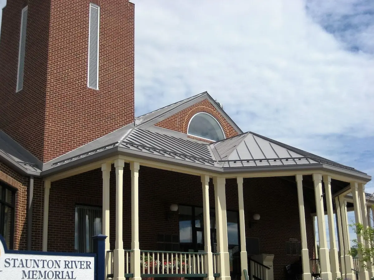 Skilled roofing craftsmen working on a residential roof in Ybor City